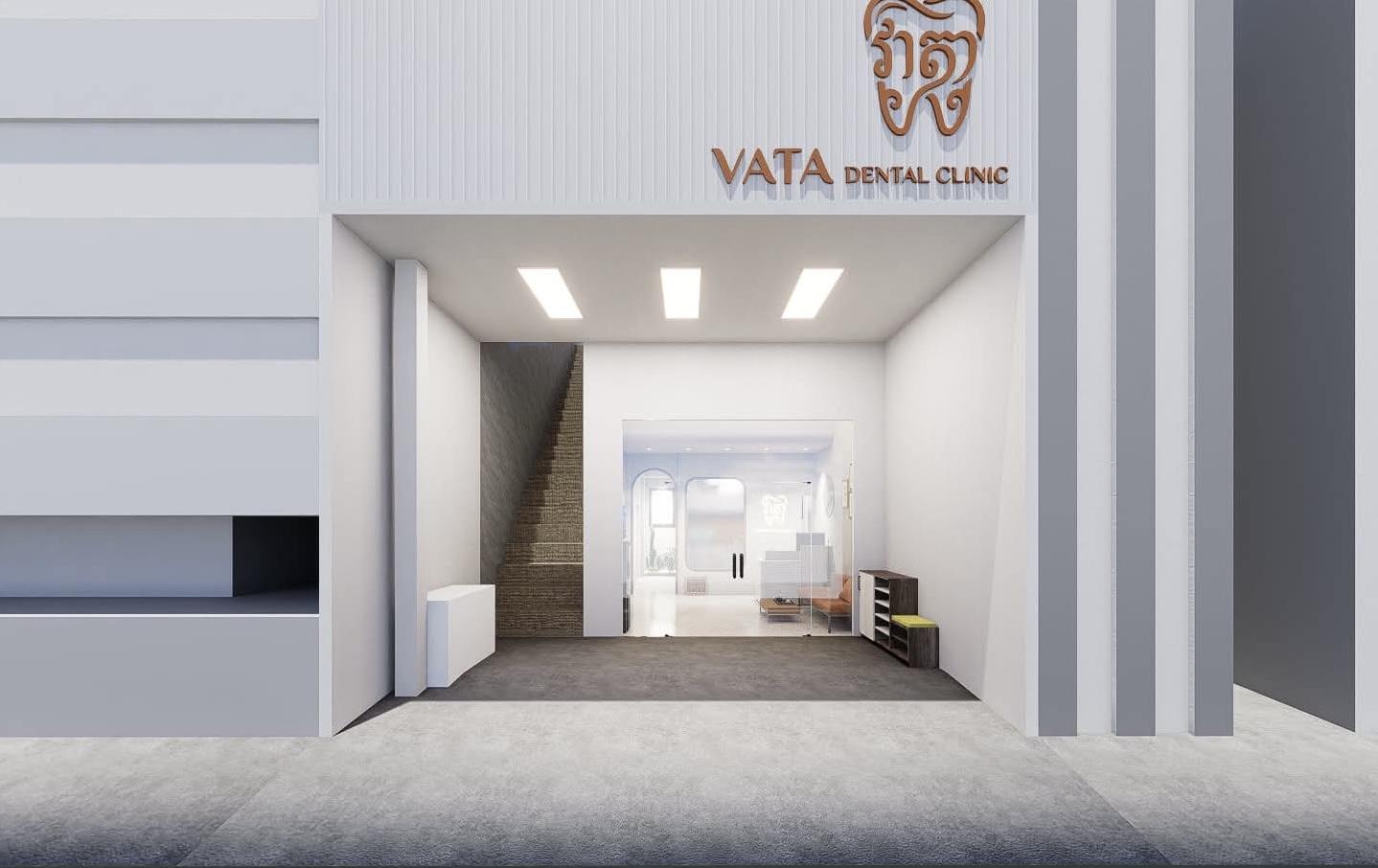 VATA Dental Clinic street entrance under the copper tooth sign