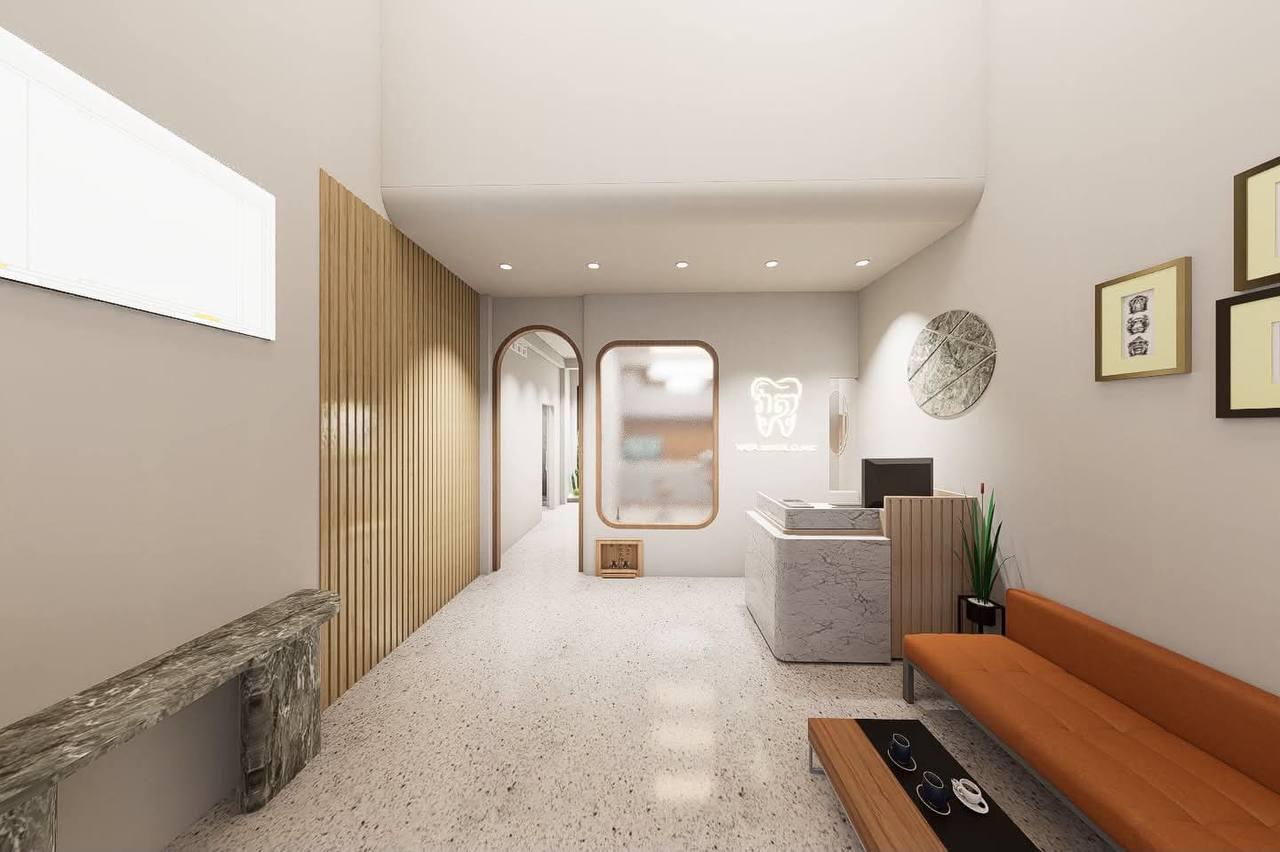 VATA reception with a marble desk, oak slats and an arched doorway